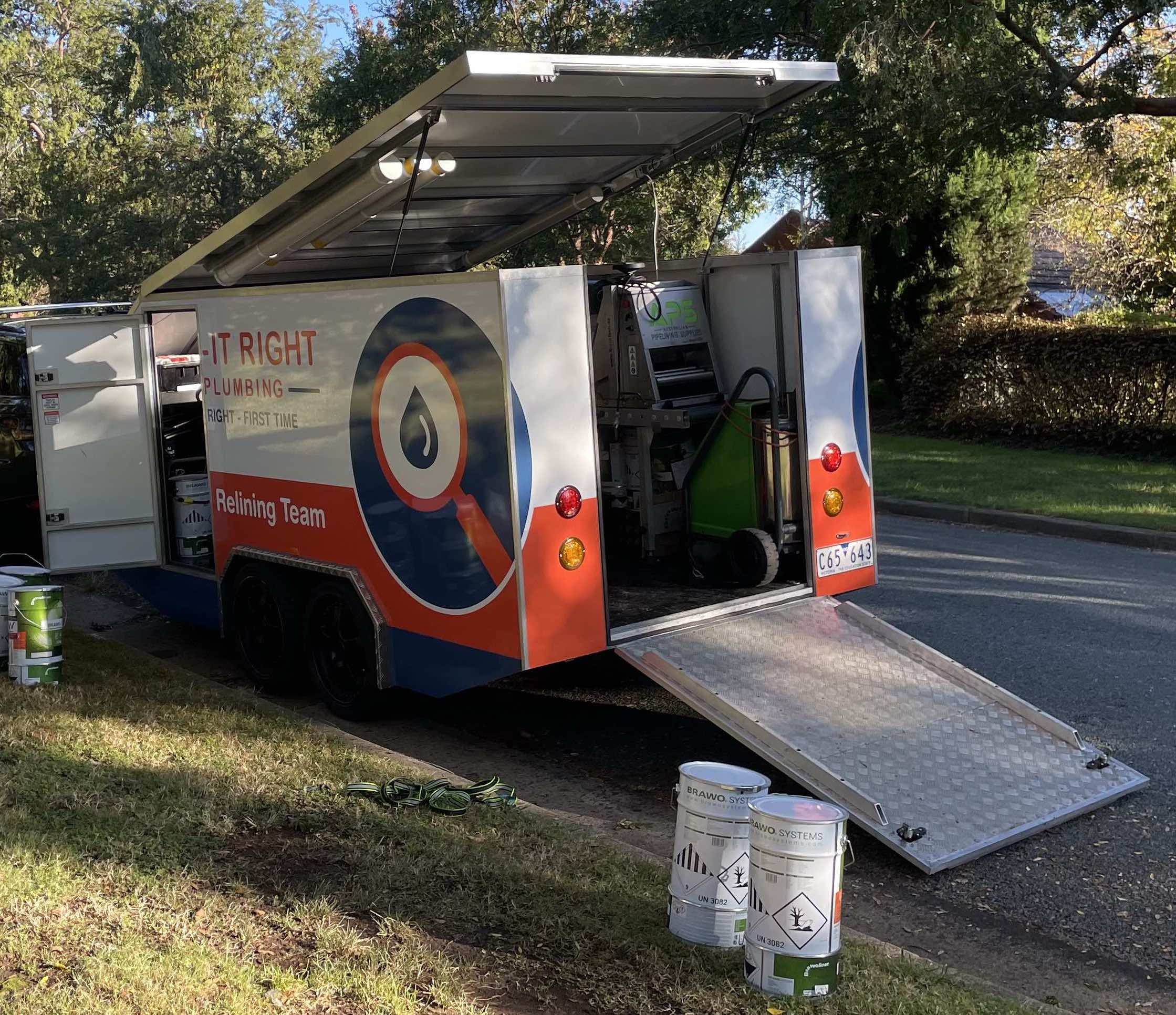Fix-It Right branded pipe relining trailer with equipment